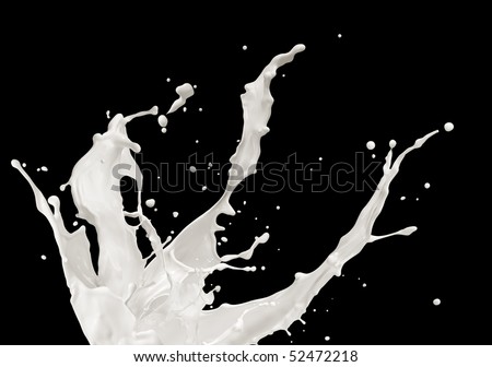 milk or white liquid splash on black background