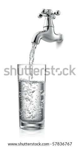 filling a glass of water from tap - stock photo
