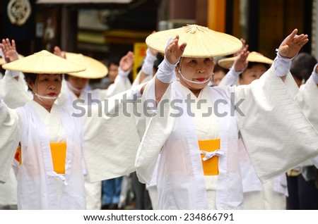 Koya, Japan - June 14, 2011: Elderly Japanese dancers in white traditional clothes during Aoba festival