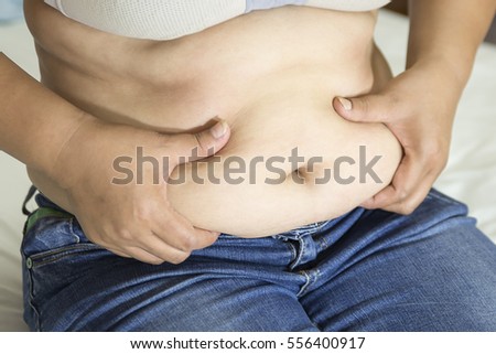 Women body fat belly front view