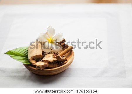 Plumeria Flower in a center piece on a table