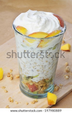 desert with whipped cream and peach