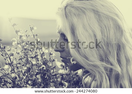 beautiful woman portrait with flower nature  sunset happy people outdoor  black and white retro vintage