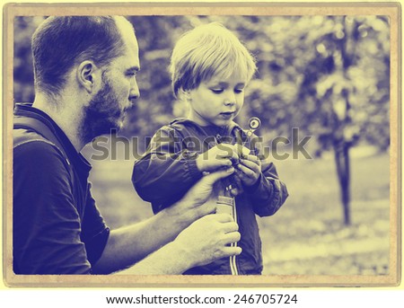 Happy people outdoors Family father and son