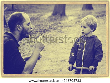Happy people outdoors Family father and son