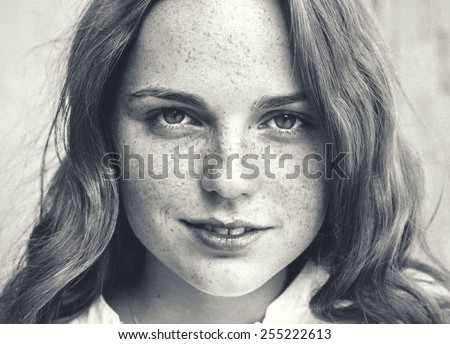 young woman natural portrait hipster black and white freckled street city stile