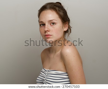 Cute woman young with freckle portrait