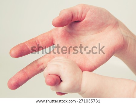 Mother hand baby hand care love family