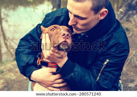 Man with dog nature dog licking man