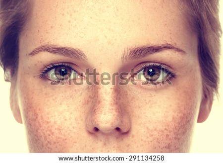 Eyes Woman freckle happy young beautiful studio portrait with healthy skin
