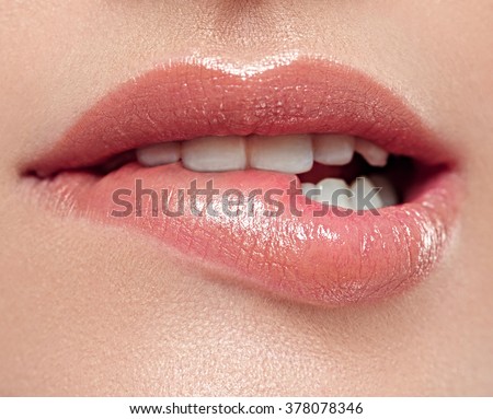 Woman lips mouth biting lip
