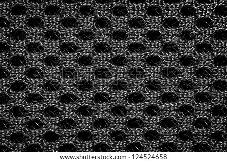 Synthetic fabric with cells pattern texture background.