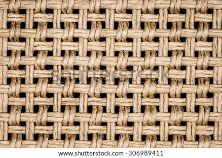 Wooden handmade basket texture closeup photo background.