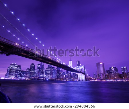 Brooklyn Bridge at night with completed Freedom Tower