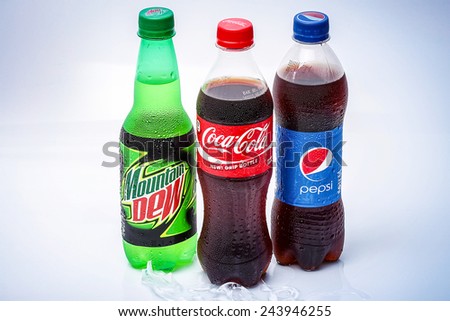 SABAH, MALAYSIA - JANUARY 13, 2015. bottle of Coca-cola, Pepsi and Mountain Dew  isolated on white.