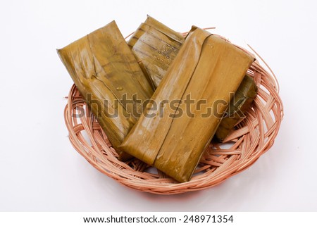traditional cake made from glutinous rice and wrapped in banana leaves