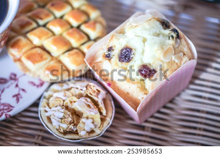 small hand made cakes and biscuits with natural light with selective focus