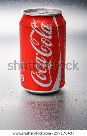 SABAH, MALAYSIA - March 08, 2015: Classic Coca-Cola Can on metal background.