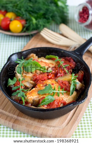 Baked chicken with tomatoes