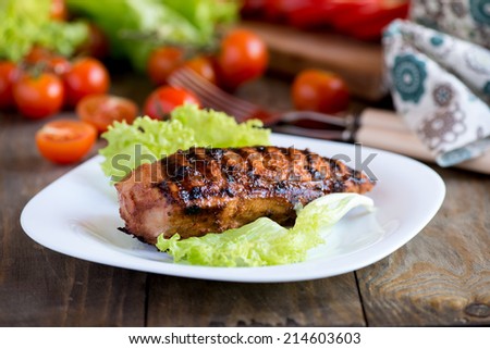 Grilled chicken breast in homemade barbecue sauce