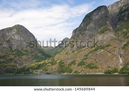 a mountain landscape in a norwegian fjord