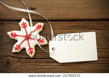 Red and White Decorated Christmas Star Cookie with white Label with Copy Space for Your Text