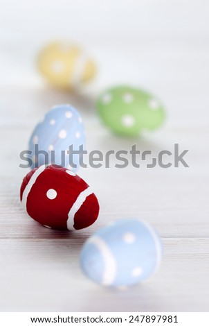 Close Up Of Five Or Many Colorful Easter Eggs On Wooden Background Which Are Dotted And Striped Vintage Shabby Chic Or Retro Style For Easter Greetings