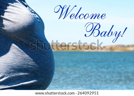 Pregnant Woman With Blue Shirt Infront of Swedish Coastline Bohuslaen Archipelago Swedish West Coast With Blue Sea Or Ocean Sunny Weather With English Text Welcome Baby