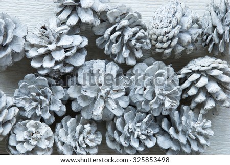White Fir Cones On Wooden Background With Copy Space Or Your Text Here .Vintage, Retro Style Used As Winter Or Christmas Background. Close Up View. Christmas Card For Seasons Greetings