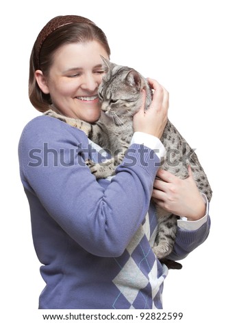 stock photo : Smiling woman holding a happy Egyptian Mau cat