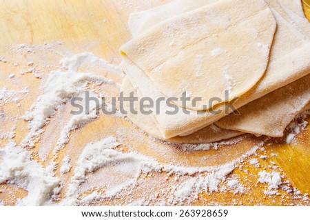 homemade pasta dough is being processed