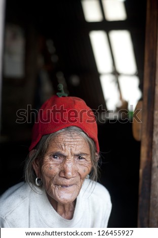 SAGADA, PHILIPPINES - MARCH 29: Portrait of an unidentified old Philippines woman on March 29, 2012 in Sagada, Philippines.  Philippines has a population of more than 92 million people.