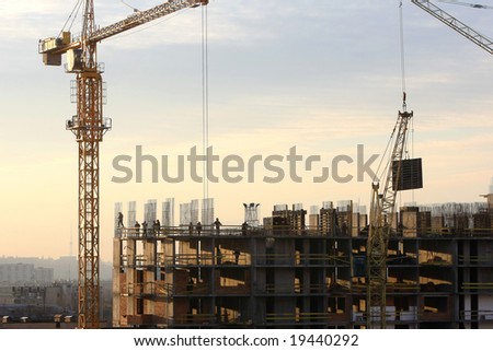 Construction activity. Silhouette of construction worker