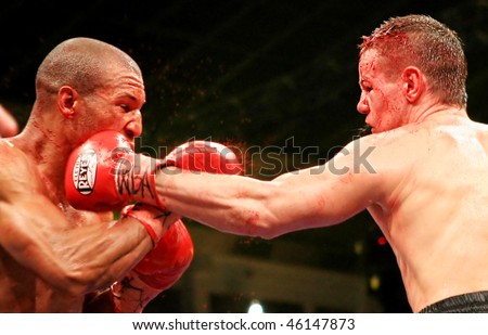 KIEV, UKRAINE - APRIL 19: WBA  welterweight belt holder Yuriy Nuzhnenko  throws a punch against Irving Garcia during their WBA World Welterweight Title fight on April 19, 2008 in Kyiv, Ukraine