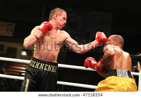 KIEV, UKRAINE - APRIL 19: WBA welterweight belt holder Yuriy Nuzhnenko throws a punch against Irving Garcia during their WBA World Welterweight Title fight on April 19, 2008 in Kyiv, Ukraine