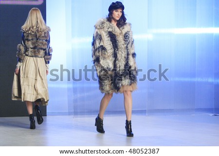 KIEV, UKRAINE - MARCH 15: A model walks the runway presenting an outfit by Hanna Babenko\'s Fall Winter 08/09 collection during the 22 Ukrainian Fashion Week on March 15, 2008 in Kiev, Ukraine