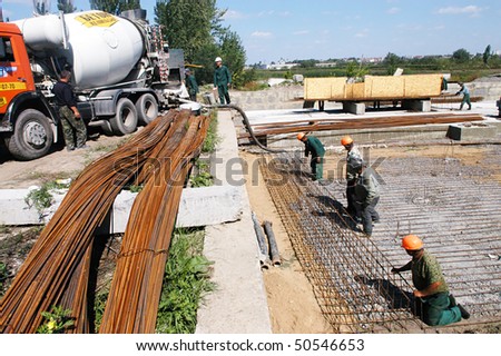 KYIV REGION, UKRAINE - SEP 3:  Workers at construction site of water filtration station during open doors day on September 03, 2007 in Kyiv region, Ukraine