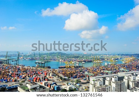 SINGAPORE - MARCH 07: Singapore commercial port on March 07, 2013 in Singapore. It\'s the world\'s busiest port in terms of total shipping tonnage, it transships a fifth of the world shipping containers