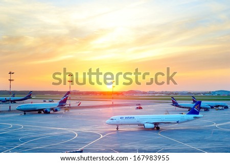 MOSCOW, RUSSIA - MAY 20: Airplane under loading in Sheremetyevo International Airport on May 20, 2013 in Moscow, Russia. Sheremetyevo International Airport is a major transport hub in Russia.