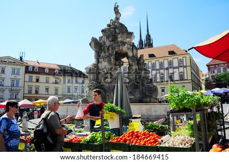 BRNO, CZECH REPUBLIC - AUGUST 29, 2013: Locals buying vegetables at street food Market in Brno . Brno is the second largest city in the Czech Republic.