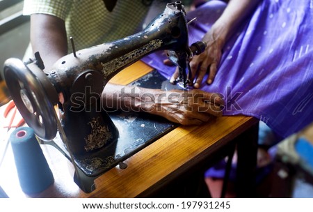 Sri Lankan tailor making new clothes