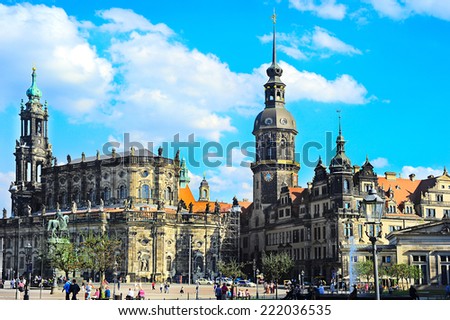 DRESDEN, GERMANY - SEPT 12, 2012: People walking at Monument of King John of Saxony, Catholic Church and Dresden Castle in Dresden, Germany