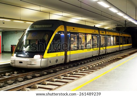 PORTO, PORTUGAL - JAN 16, 2015: Tram in the underground staion in Porto, Portugal. Porto Metro was founded in 1993, and the first line of the system opened in 2002.