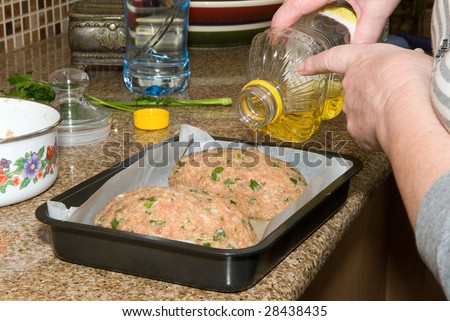 Raw meat pie watered soybean oil before baking in oven