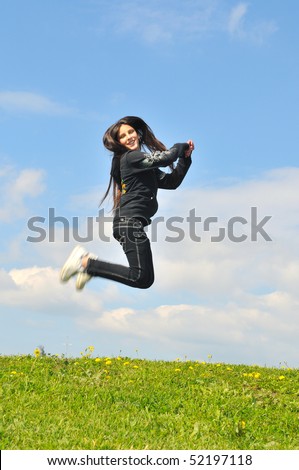 The girl jumped into the top to feel the joy of flying