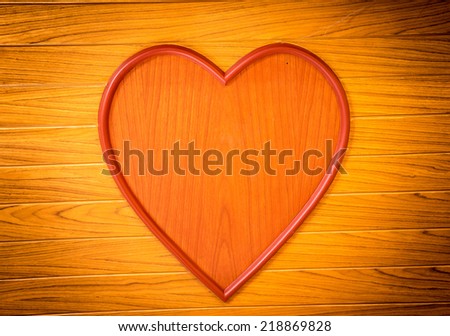 the wood texture with heart on the wall in home