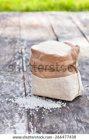 rice bag on the gray table with green grass