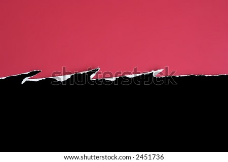 Black card jagged tear on a red background