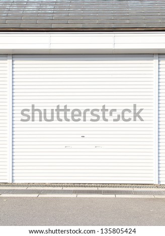 Illuminated grunge metallic roller shutter door