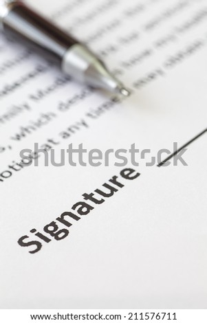 close - up signature space on contract document